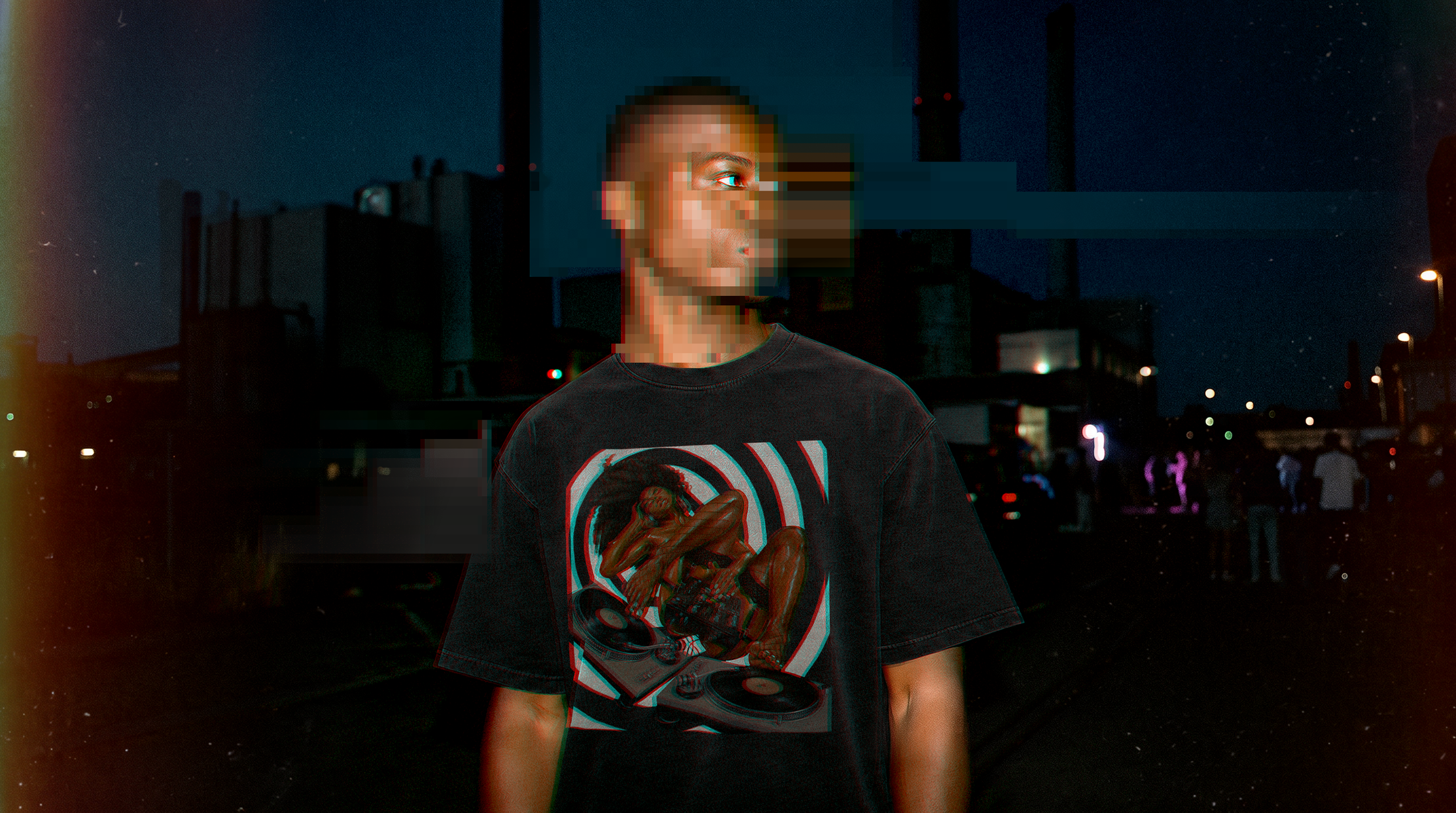 Mixed Pleasure T-shirt photographed at night